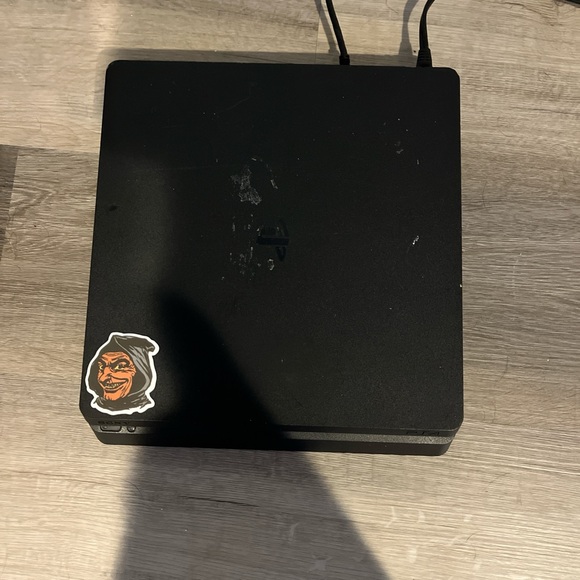 Black Gaming Console with Graphic Sticker